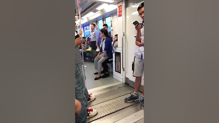 Young guy refuses to give up his subway seat to auntie, so she sits on his lap