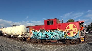 Local mixed freight train with caboose and 2 Santa Fe GP 60