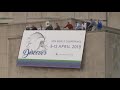 2019 World Conference banner hanging