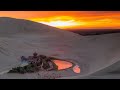 Live: Crescent-shaped lake surrounded by deserts in NW China