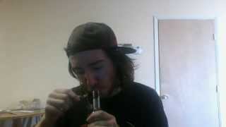 grinding up weed and smoking a bowl