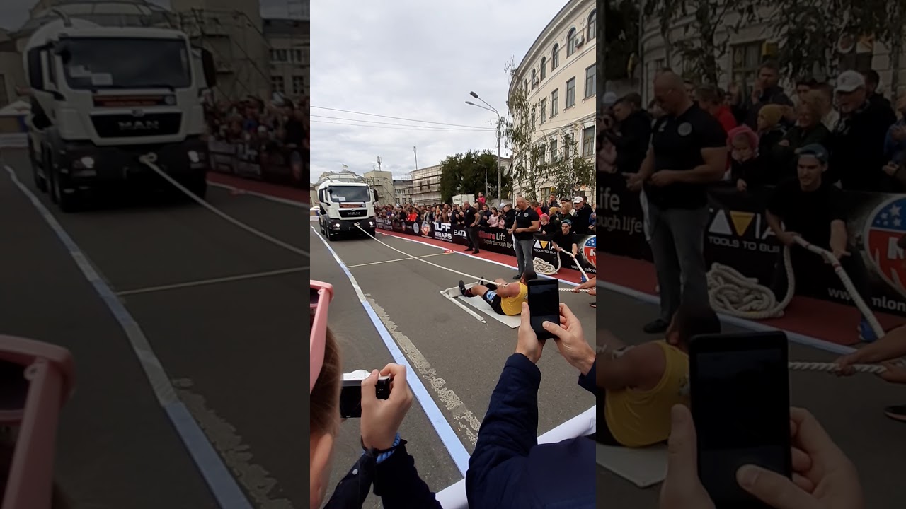 Strong man truck pull competition Podil District, Kiev, Ukraine 2019