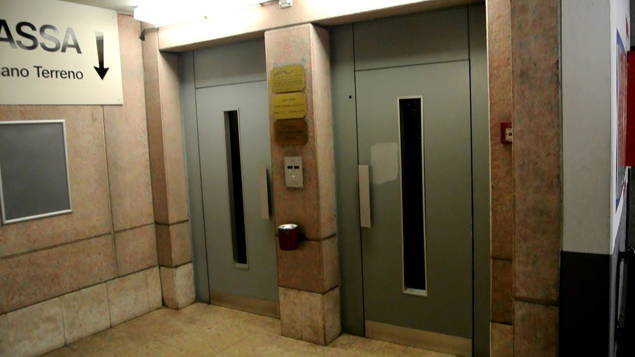 4x original Schlieren traction elevators w/o inner doors @ a parking garage in Lugano, Switzerland