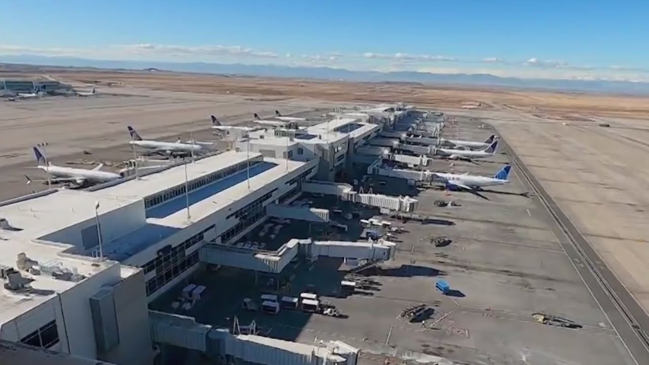 Holiday travel ramps up at Denver International Airport - YouTube