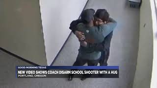 New video shows coach disarm school shooter with a hug