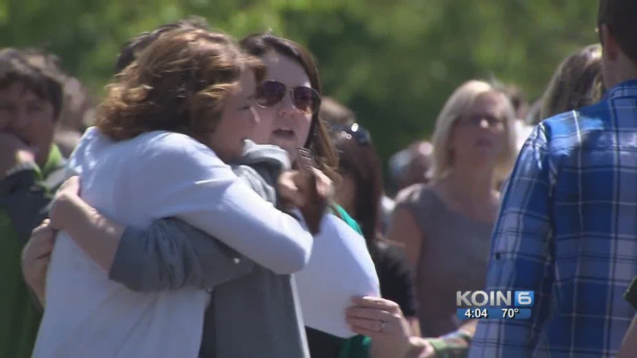 Parents, children reunite after high school shooting - YouTube