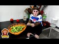 YoYo Jr cooks asparagus himself