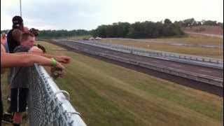 Chris Finally wins the 3rd race in his red Moke against his friend Christian in his green Moke