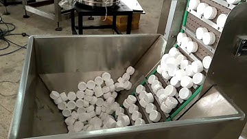 cap folding and lining machine with auto liner feeder