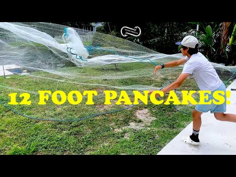 KID OPENS A 12 FOOT CAST NET WITH EASE HOW DOES HE DO IT? 