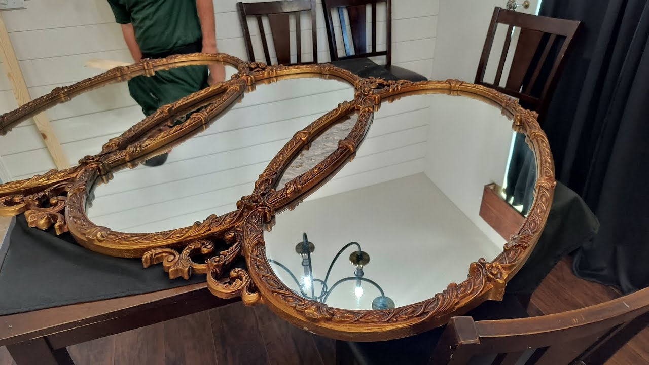 Antique mirror hung using French cleat