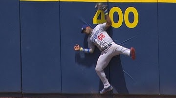 Puig leaps at the wall, makes fine catch