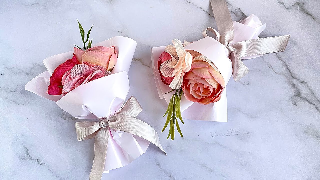 DIY bridal bouquets and wedding guest favors with colorful floral pins