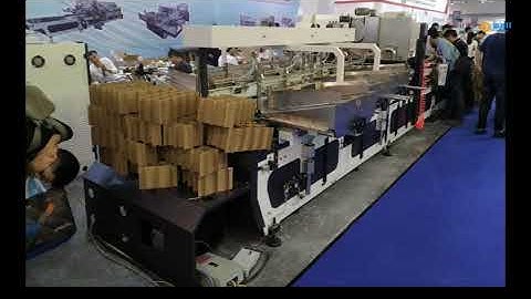 Automatic partition cardboard assembly machine with stacker