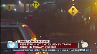 Pedestrian hit by garbage truck, dies