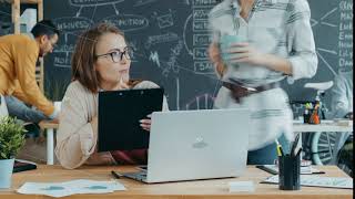 Time lapse of business lady busy with work in open space office cooperating with colleagues