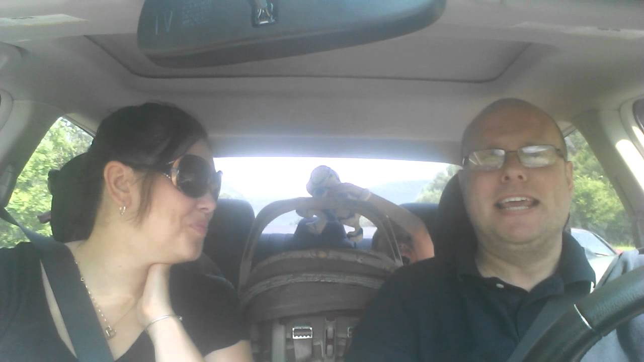 Really Really good looking parents singing frozen