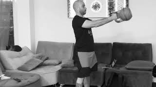 Single Arm Odd Object Russian Swing