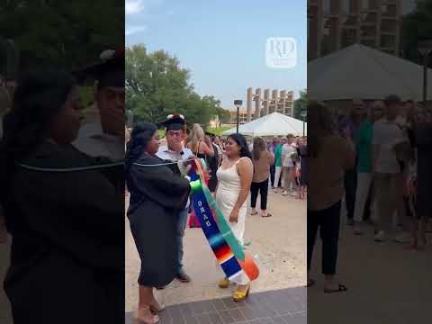 Girl Gives Her Graduation Stole And Cap To Her Parents