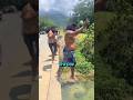 Why Does a Ball Shoot High Into the Air When Someone Jumps into the Water?