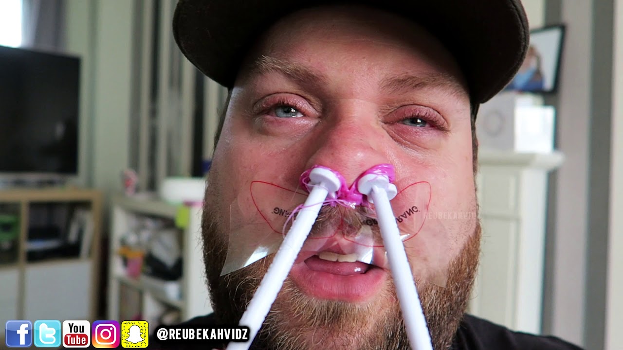 Girlfriend waxes boyfriend's nose hair!