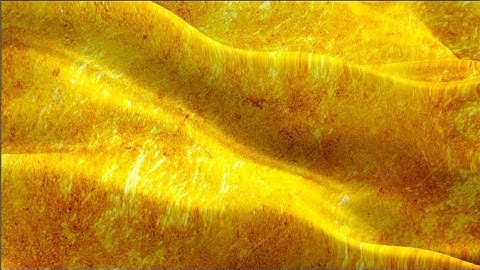 Gold flag video waving in wind. Realistic golden Flag background. Gold Flag Looping Closeup 1080p HD