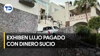 Luxury cars and mansions were part of alleged criminal network