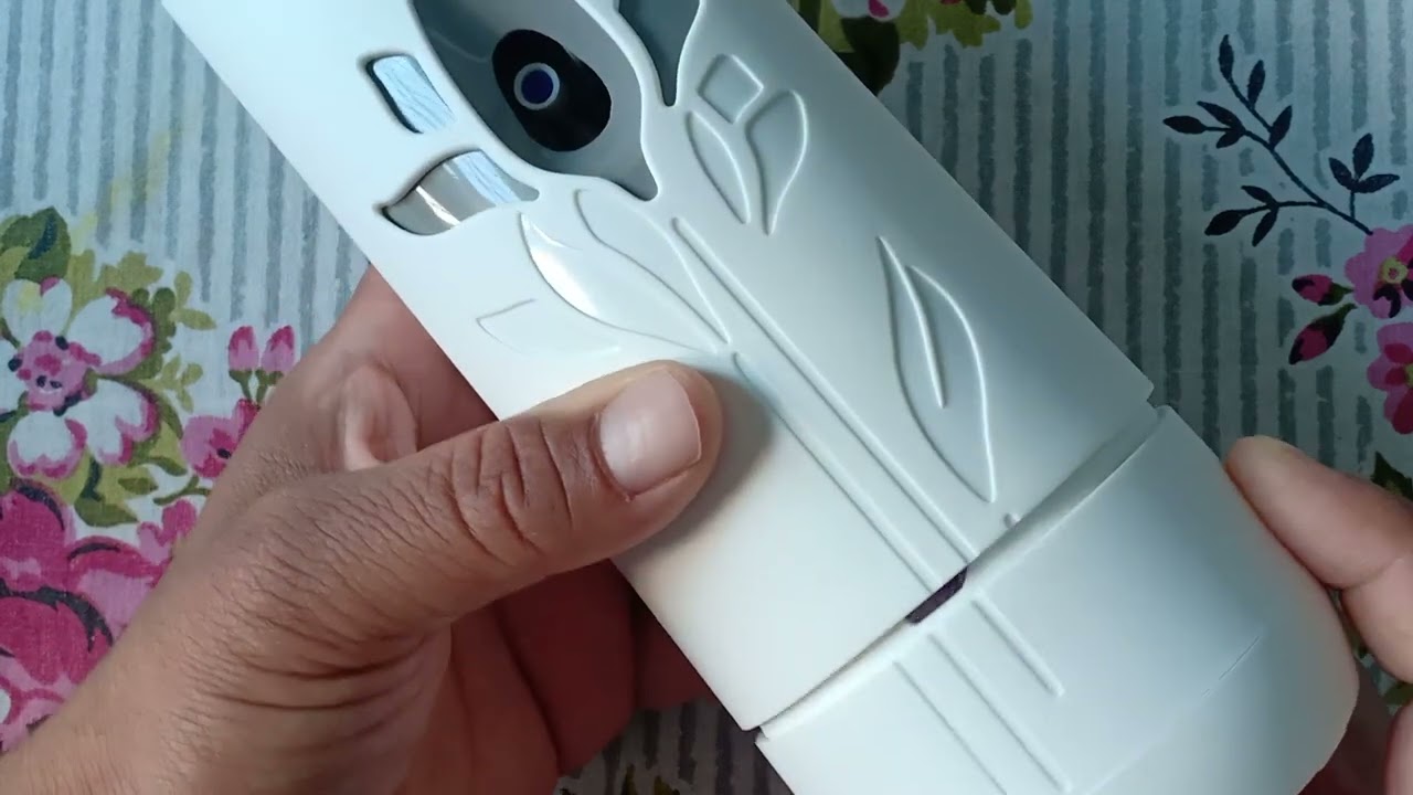 How do you install an Air Wick automatic spray?