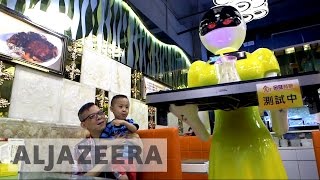 Hong kong: robots join restaurant staff