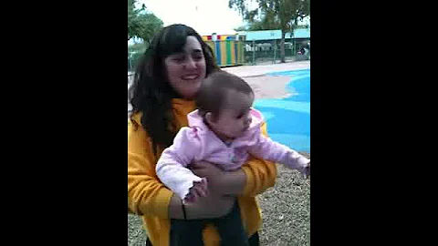 Jenny and Jamie going down the slide
