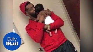 Adorable moment dad comforts baby while getting first shots