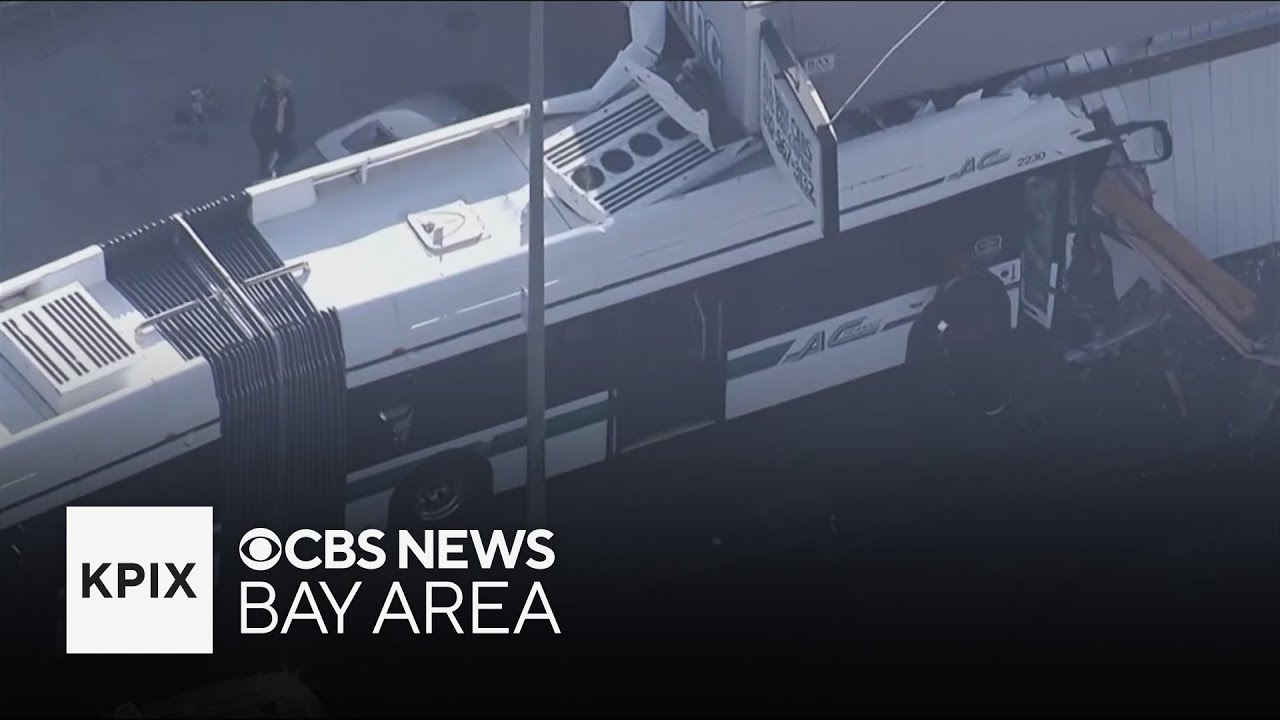 Several injured after AC Transit bus collides with vehicle, rams into building in Oakland