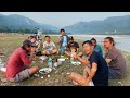 Cooking some fresh fish and pork bbq at saptakoshi river side  pure local style