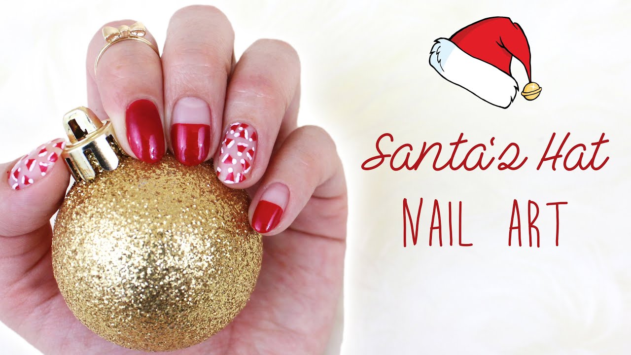 5. Red and White Santa Hat Nail Designs - wide 2