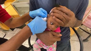 BABY GETS HER EARS PIERCED