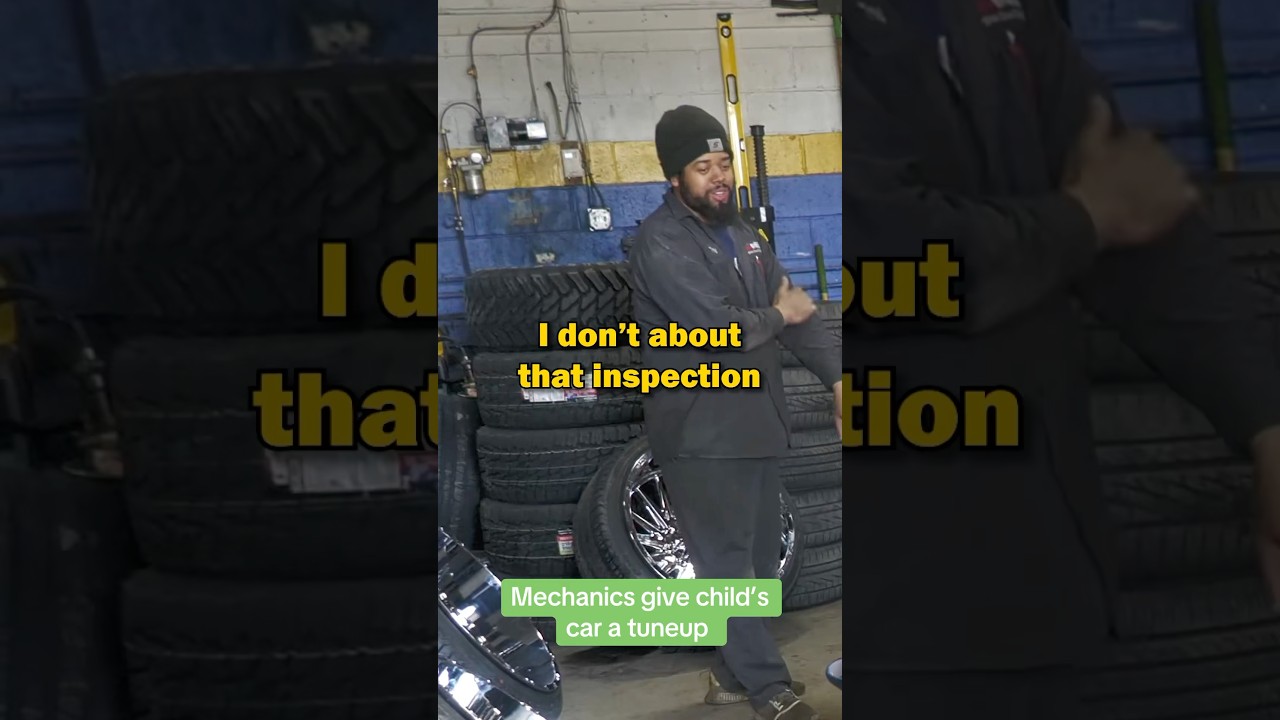 Mechanics Give Childs Car A Tuneup