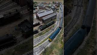 Class 24/0 pulling a passenger train, the overhead view.