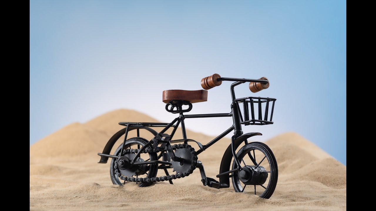 Making a miniature bike look real through lens compression