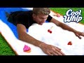 WORLDS MOST DELICIOUS WATER SLIDE!! (Mystery Box Challenge)