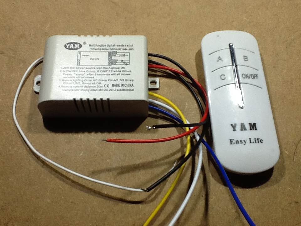 Inside a cheap 3-way remote control switch. (With schematic.) 