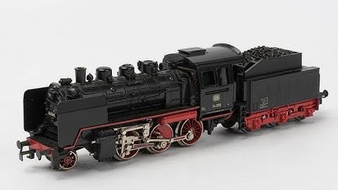 Märklin DB BR 24 Steam Locomotive pulling Freight Train on Marklin M-Track Layout