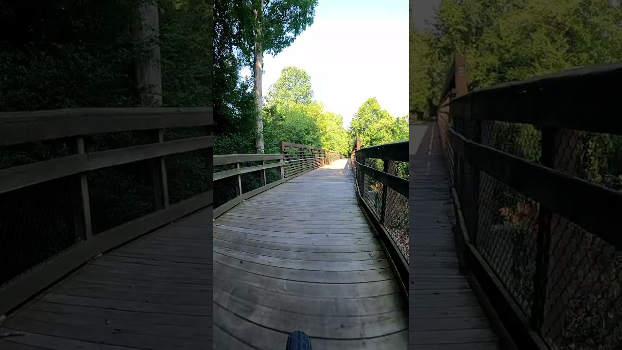 Biking a Long Boardwalk on the Neuse River Trial in North Carolina