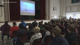 Caribou watches one of their own make dream come true