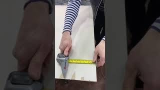 Drywall knife with built-in tape measure \\ Нож для гипсокартона с встроенной рулеткой