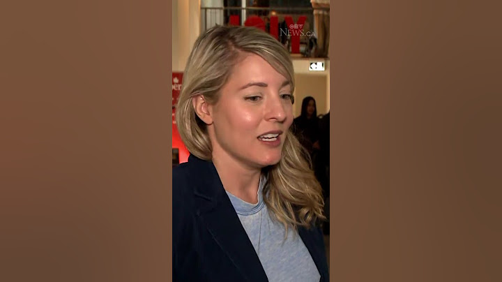 Liberal candidate Melanie Joly reacts to early election results