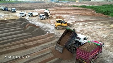 Serious Skills Operator Working On Sticky Dirt Bulldozer SHANTUI And Dump Truck Moving Sand