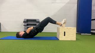 Elevated glute bridge - spine roll up