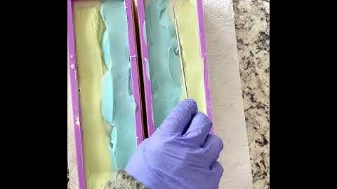 Cold process soap. Swirling the top layer.