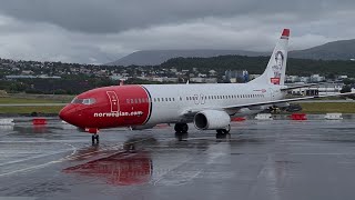 A wet Norwegian 737-8 arriving at the stand!