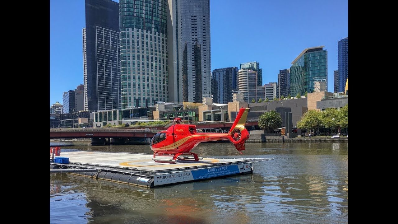 Helicopter landing and takeoff along Yarra River, Melbourne, Australia